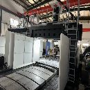 []纽威4米龙门，工作台2.5米4米，门宽3.3米，门高1.7米.